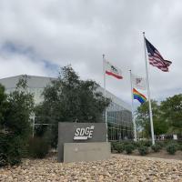 Rainbow flag flying outside Century Park
