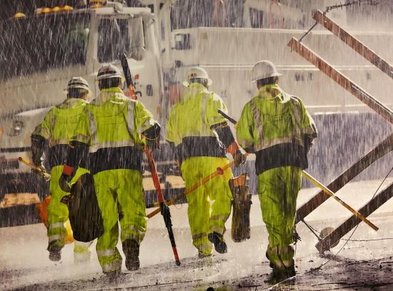 Crews working in storm conditions