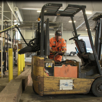 The Port's electric forklift being plugged into the new and efficient charging stations.
